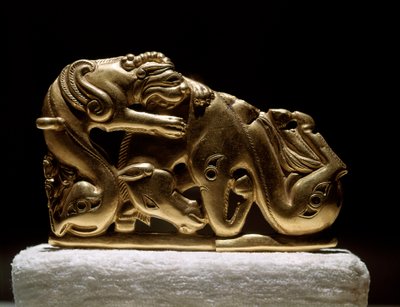 Scythian art: gold belt fibula depicting a griffin attacking a horse. From Chiliktin. 5th-4th century BC by Scythian