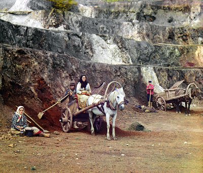 Work at the Bakalskii mine: a family, with shovels and horse-drawn carts, working at the iron mines in the Bakaly hills, Ural Mountains, Russian Empire, 1910 by Sergey Prokudin Gorsky