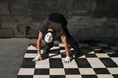 France, Paris: Street performer along the pier of the Seine River, 2022 by Sisse Brimberg