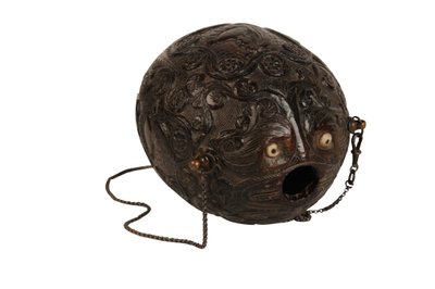Carved Coconut Powder Flask Bugbear, Spanish Colonial, c.1800 by Spanish School