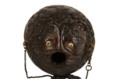 Carved coconut powder flask bugbear, Spanish Colonial, early 19th century by Spanish School