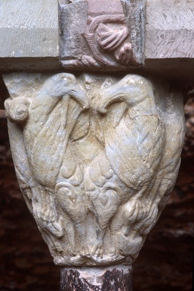 Detail of an arcade capital with sculpture of two birds by Spanish School