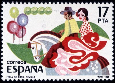 The Feria of Seville: couple in folk costume on horseback by Spanish School