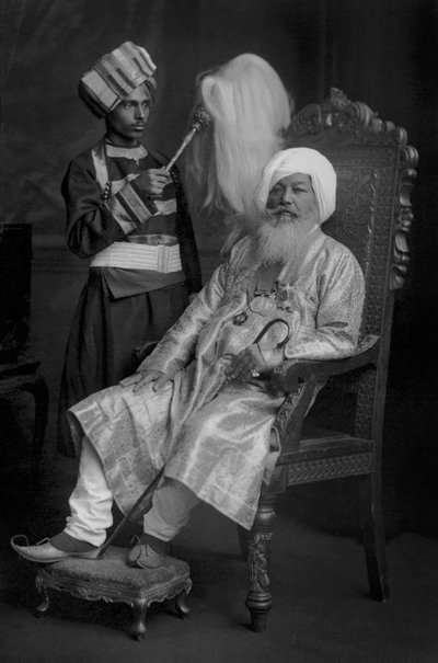 Baba Sir Khem Singh Beda with a Servant by Studio Lafayette