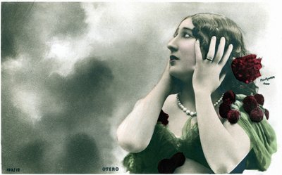 Beautiful Otero against a background of clouds, postcard early 20th century by Studio Reutlinger