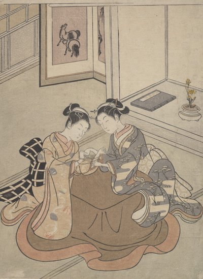 Two Young Women Seated by a Kotatsu Playing Cat