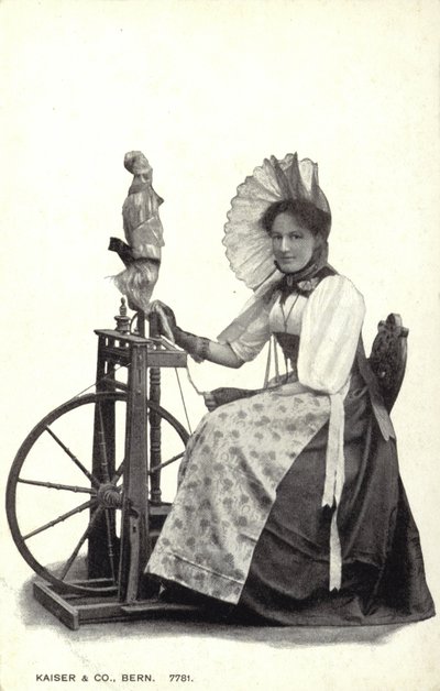 Woman Seated at a Spinning Wheel by Swiss Photographer