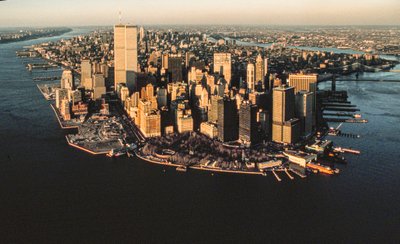 Aerial view of Lower Manhattan waterfront from New York Harbor including World Trade Center by Ted Spiegel