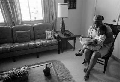 African-American Woman and Child in New Low-Income Housing in Rural Virginia by Ted Spiegel