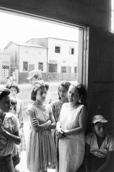 Ecuadorian women waiting anxiously for meetings with medical personnel from hospital ship SS Hope by Ted Spiegel