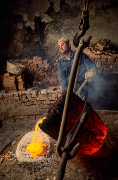Foundry Worker Casting Molten Bronze, Florence by Ted Spiegel