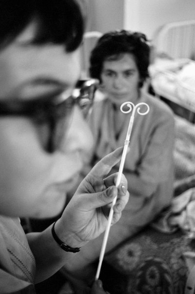 Medical personnel describe IUD insertion to Chilean women for birth control by Ted Spiegel