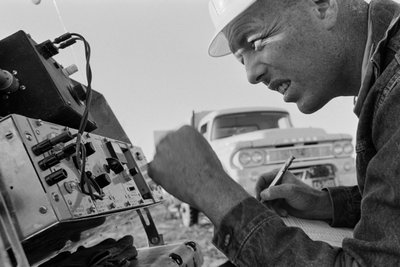 Mineralogist studies data at Morenci mine for Phelps Dodge Smelter Douglas Arizona by Ted Spiegel