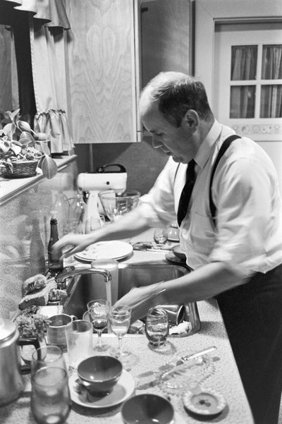 Reverend Lincoln Reed Washes Dishes in Kitchen After Family Sunday Supper by Ted Spiegel