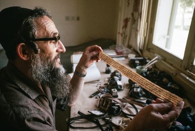 Scribe checks a Tefillin