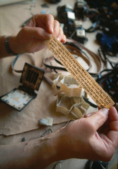Scribe checks a Tefillin