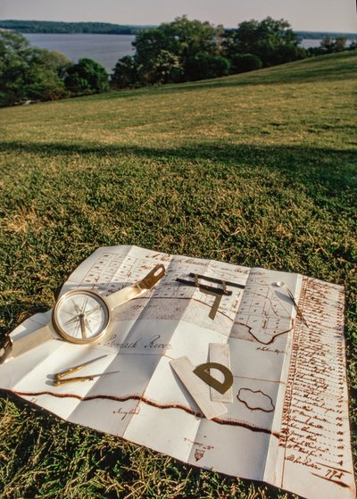 Surveying tools and map of Alexandria by George Washington by Ted Spiegel