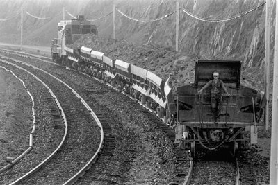 Train carrying copper ore from mine to smelter at Phelps Dodge Smelter Douglas Arizona by Ted Spiegel