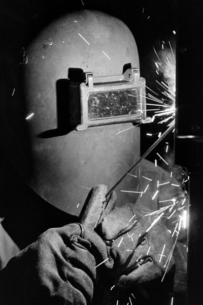 Welder at Phelps Dodge Smelter Douglas Arizona, smelting copper from Phelps Dodge by Ted Spiegel