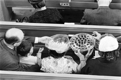 Wine is passed during Communion during a Sunday service at First Congregational Church by Ted Spiegel