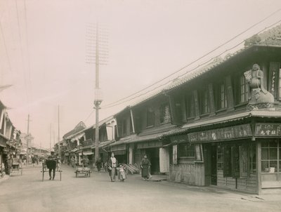 A Shopping Street in the Motomachi District of Kobe, circa 1900 - 1915 by Teijiro Takagi