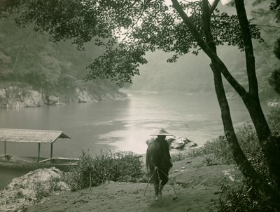Fisherman by the Hozu River, Arashiyama District, Kyoto, circa 1900 - 1915 by Teijiro Takagi