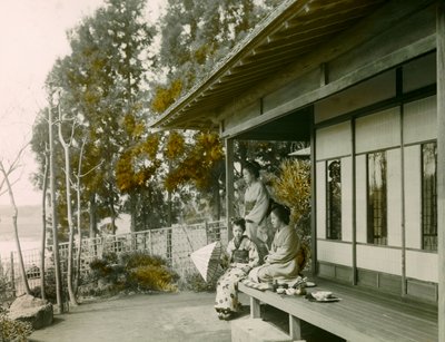 Japanese Family in Front of Their Home, circa 1900 - 1915 by Teijiro Takagi