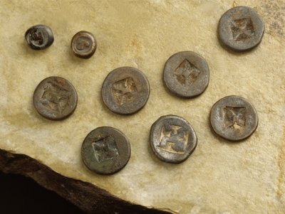 Money with flower and namo marks from the Srivijaya Kingdom by Thai School