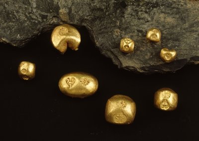 Twenty-two carat bullet coins from the reign of King Rama IV by Thai School