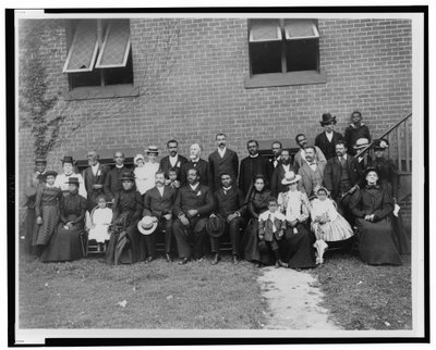 Members of the First Congregational Church, Atlanta, Georgia, posed outside the brick church by Thomas Askew