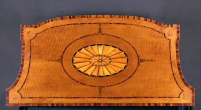 One of a pair of George III commodes by Thomas Chippendale
