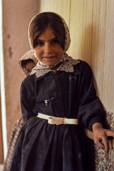 Young Iranian girl in dress and scarf by Thomas J. Abercrombie