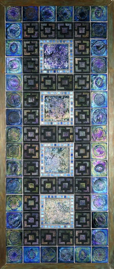 A Favrile glass tile panel, molded with flowers and geometric designs, 20th century by Tiffany Studios