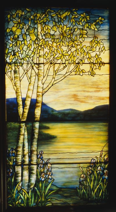 Landscape window of a distant view across water with birch trees and irises in the foreground by Tiffany and Company