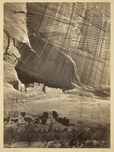 Ancient Ruins in the Canyon de Chelly, N.M. In a niche 50 feet above present Canyon bed. by Timothy O