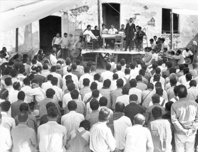 Meeting of the Campesinos: At the table Xavier Guerrero and Julio Antonio Mella, Jalapa, Mexico, 1927 by Tina Modotti
