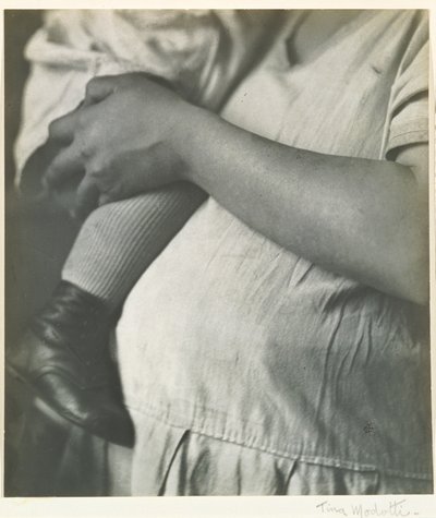 Woman with Child by Tina Modotti