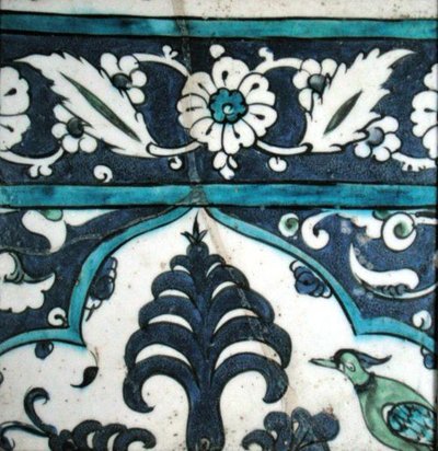Isnik tile with floral design and border by Turkish School
