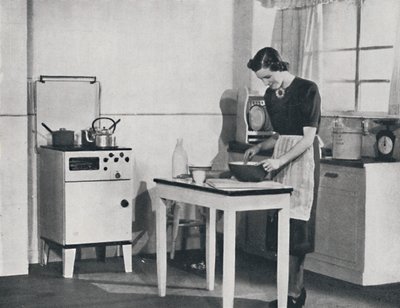 A British kitchen equipped with a cabinet gas cooker by Unbekannt