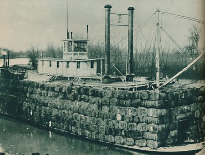 A Full Load of Cotton Often Mounts High Over the Decks of the Mississippi Steamboats by Unbekannt