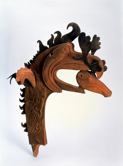 A griffin holding a deer