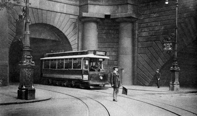 A tram running beneath Kingsway, Aldwych and Somerset House, London by Unbekannt