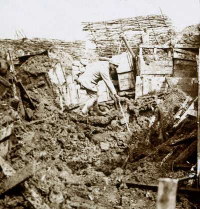 Aftermath of a Shell, a Soldier in the Crater by Unbekannt