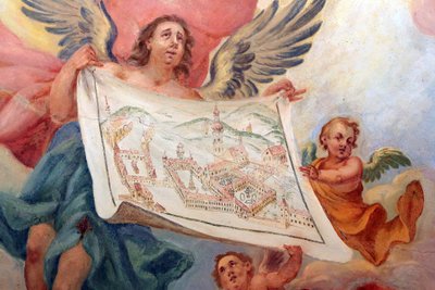 Angel holding a plan of the Abbey of Heiligenkreuz. Heiligenkreuz Abbey, Vienna, Austria by Unbekannt