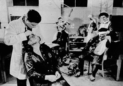 Behind The Lines Were Many Workers. With the Blitz Still at Its Height, Casualties Are Attended To by Unbekannt