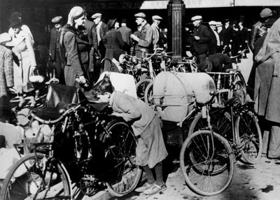 Belgian Refugees with Their Bicycles and Possessions Outside the Gare du Nord, Paris by Unbekannt