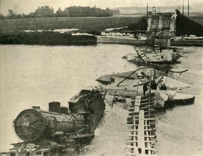 Bombed bridge and derailed train, northern France, First World War, 1914, c1920 by Unbekannt