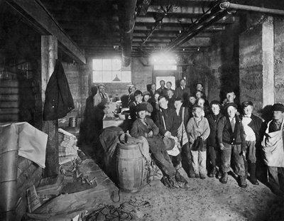 Boys Picking Up Papers To Sell, United States, c.1919 by Unbekannt