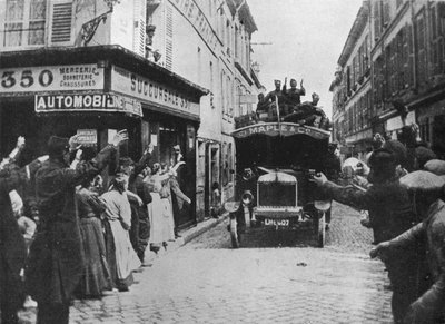British Troops Receive a Welcome as They Arrive by Motor Van in a French Town by Unbekannt