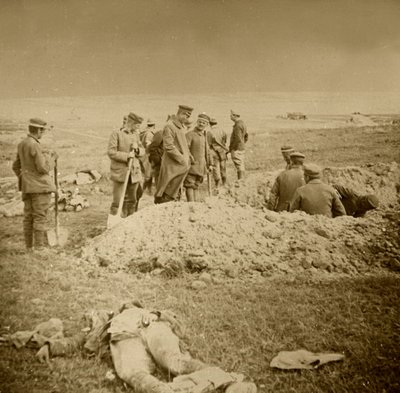 Burying Bodies, Sainte-Marie-à-Py, Northern France by Unbekannt